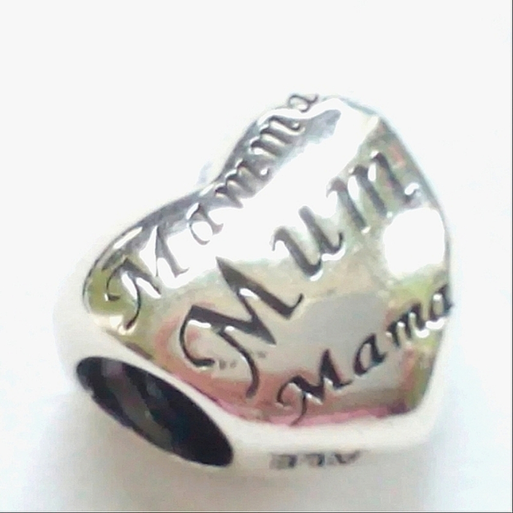 Authentic Like New Pandora Carved Mother's Heart Charm